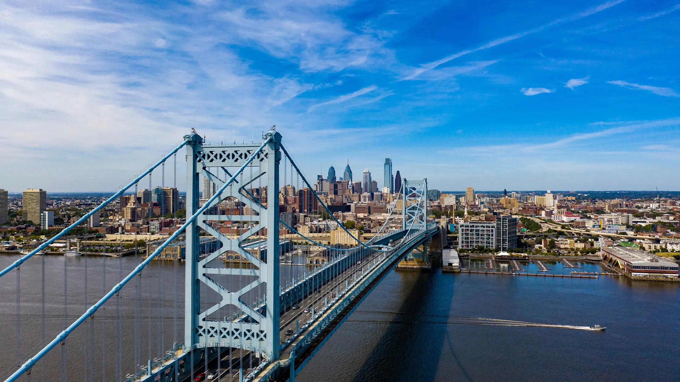 Philadelphia skyline with theme park in distance